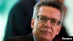 FILE - German Interior Minister Thomas de Maiziere attends a cabinet meeting at the Chancellery in Berlin.