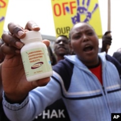 Demonstraters in Nairobi, Kenya on Thursday, Dec. 9, 2010, protest a potential free trade area agreement between the EU and India that could see cheap generic anti-AIDS drugs phased out. (AP Photo/Khalil Senosi)