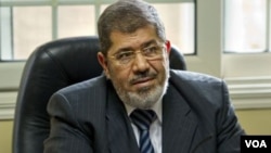 Presiden Mesir, Mohammad Morsi memberi pengampunan kepada para tahanan politik yang terlibat dalam penggulingan Hosni Mubarak (Foto: dok).