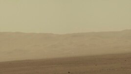 FILE - This color image taken August 8, 2012 from NASA's Curiosity rover, and released August 13, shows part of the wall of Gale Crater, the location on Mars where the rover landed on August 5, 2012.