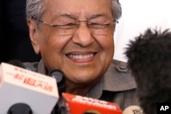 Mahathir Mohamad reacts as he speaks during a press conference at a hotel in Kuala Lumpur, Malaysia, May 10, 2018.