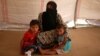 500 femmes de jihadistes étrangers déplacées en vue de leur expulsion d'Irak