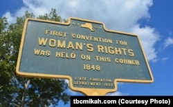 This plaque, in Seneca Falls, New York, marks the site where the women's rights movement was set in motion.