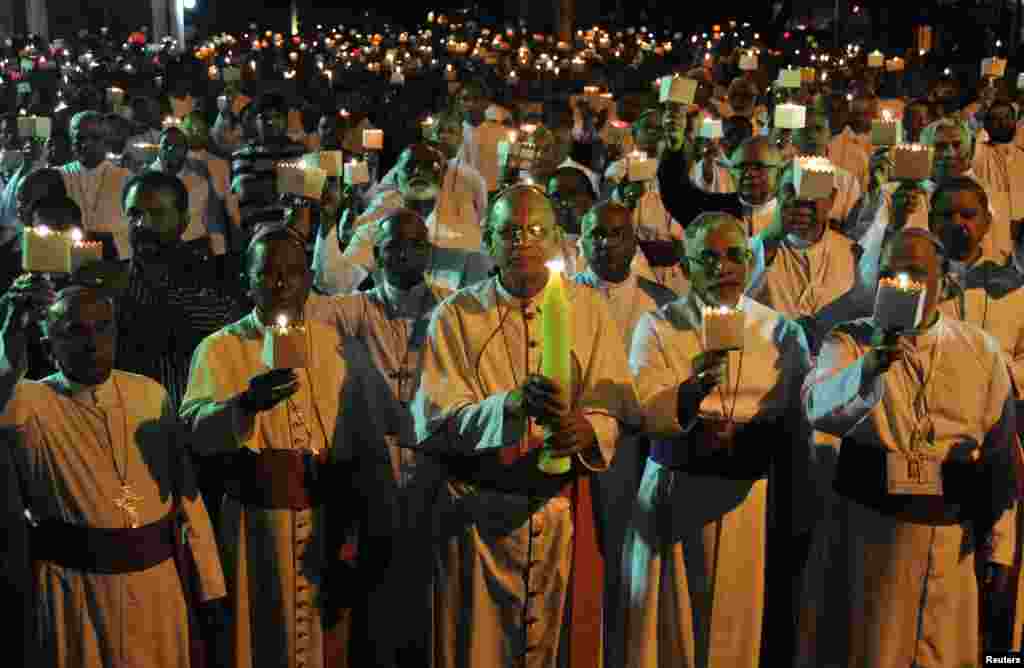 Catholic bishops, from different Indian dioceses, participate in a candlelight protest against recent attacks on churches, in the southern Indian city of Bengaluru. Five churches in the Indian capital have reported incidents of arson, vandalism and burglary.