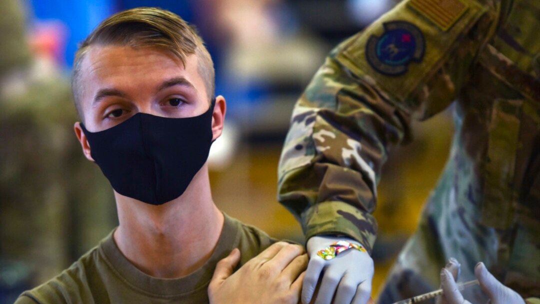 FILE - Hickam 15th Medical Group hosts the first COVID-19 mass vaccination on Joint Base Pearl Harbor-Hickam, Feb. 9, 2021, in this photo provided by the Department of Defense.