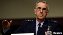 FILE - U.S. Air Force General John Hyten, commander of U.S. Strategic Command, testifies at a Senate Armed Services Committee hearing on Capitol Hill in Washington, April 4, 2017. 