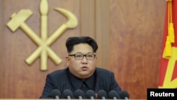 FILE - In his New Year's address, Kim Jong Un called for improved ties with Seoul, sparking speculation that he might pursue a conciliatory course as part of preparations for a major party convention in May.