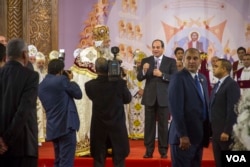 Egyptian President Abdulfattah Al-Sisi talks to Coptic worshipers during Christmas eve mass at the new Coptic Cathedral in Egypt, Jan 6, 2018. (Photo: Hamada Elrasam for VOA)