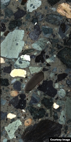 A portion of the drilled cores from the rocks that filled the crater. Scientists found melted and broken rocks such as sandstone, limestone and granite. This finding suggests that the impact vaporized these rocks forming sulfate aerosols in the atmosphere