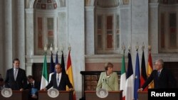 Španski premijer Marijano Rahoj, francuski predsednik Fransoa Oland, nemačka kancelarka Angela Merkel i italijanski premijer Mario Monti