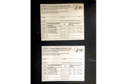 Undated image provided by the United States District Court for the Northern District of California shows two fake CDC COVID-19 Vaccination Record Cards that are part of a criminal complaint.
