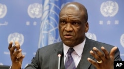 FILE - John Ashe, Antigua and Barbuda's former U.N. ambassador, speaks during a news conference at U.N. headquarters, Sept. 17, 2013.