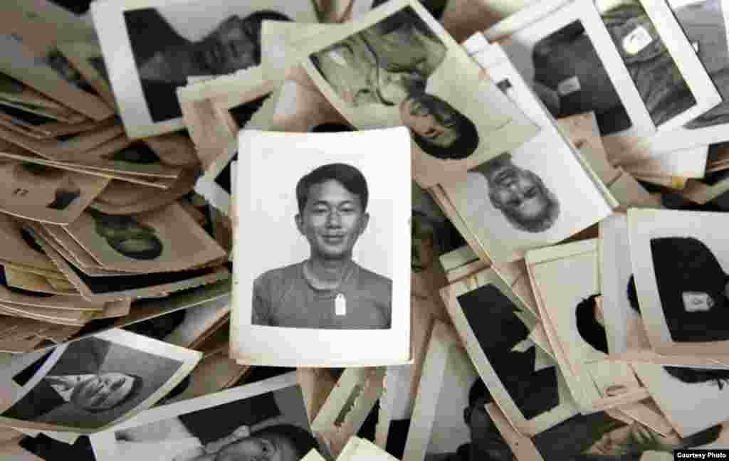 A pile of mugshots provided to the Documentation Center of Cambodia by an anonymous collector. (Credit: DC-Cam)