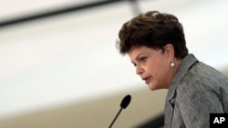 Brazil's President Dilma Rousseff delivers a speech in Brasilia, August 8, 2011