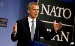 NATO Secretary General Jens Stoltenberg speaks during a news conference at NATO headquarters in Brussels, Oct. 8, 2015.