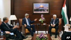 U.S. Secretary of State John Kerry, center left, meets with Palestinian President Mahmoud Abbas, center right, on Friday, July 19, 2013 in the West Bank city of Ramallah.