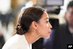Rep. Alexandria Ocasio-Cortez, D-N.Y., arrives to hear President Donald Trump deliver his State of the Union address on Capitol Hill in Washington, Feb. 5, 2019.