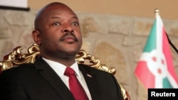 FILE - Burundi's President Pierre Nkurunziza attends the opening of a coffee conference in the capital Bujumbura, Feb. 13, 2014. 