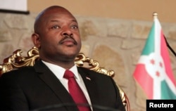 FILE - Burundi's President Pierre Nkurunziza attends the opening of a coffee conference in the capital Bujumbura, Feb. 13, 2014.