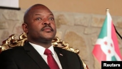 FILE - Burundi's President Pierre Nkurunziza attends the opening of a coffee conference in the capital Bujumbura, Feb. 13, 2014. 