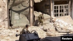 叙利亚政府军9月23日在阿勒颇一个街区