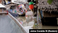 Flooding is seen in Bato, Camarines Sur, Philippines, Jan. 1, 2019 in this still image from video obtained from social media, Jan. 2, 2019.