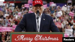 U.S. President-elect Donald Trump speaks during a USA Thank You Tour event in Mobile, Alabama, Dec. 17, 2016. From Alabama, he flew to Florida for the holidays.