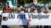 Reporters hold a banner with a question that asks in French: "Where is Vladjimir?" as hundreds of journalists marched to demand an investigation into why the 30-year-old photojournalist Vladjimir Legagneur vanished while on assignment, in Port-au-Prince, Haiti, March 28, 2018.