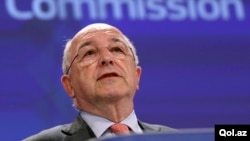 FILE - European Union Competition Commissioner Joaquin Almunia addresses a news conference at the EU Commission headquarters in Brussels June 11, 2014. The European Commission said on Wednesday it had opened three in-depth investigations into tax decision
