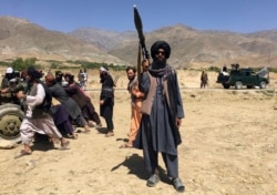 Taliban soldiers stand guard in Panjshir province northeastern of Afghanistan, Wednesday, Sept. 8, 2021.
