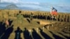 在韩国济州岛山房山脚下为几位选择去台湾的志愿军战俘举行葬礼（1952年，美军宪兵拍摄）
