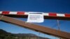 A sign is seen on the gate of a National Park Service site is closed in the Santa Monica mountains, Agoura Hills, California, October 1, 2013.
