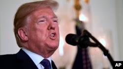 President Donald Trump speaks in the Diplomatic Reception Room of the White House on, April 13, 2018, in Washington, about the United States' military response to Syria's April 7 chemical weapons attack.