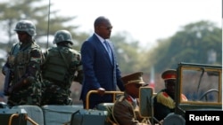 FILE - Burundi's President Pierre Nkurunziza arrives for an independence day celebration in Bujumbura, July 1, 2017. The government has suspended VOA and BBC broadcasts for six months.