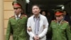 Ông Trịnh Xuân Thanh bị đưa ra xét xử tại Hà Nội sau khi xảy ra vụ bắt cóc và bị kết án tù chung thân.