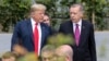 FILE - President Trump, speaks with Turkey's President Recep Tayyip Erdogan ahead of the opening ceremony of the NATO summit in Brussels, July 11, 2018.