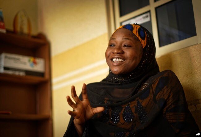 FILE - Zainab Sulaiman Umar, 26, a candidate for the State House of Assembly in Kumbotso constituency, Kano state, speaks to the Associated Press at an activists office in Kano, northern Nigeria, Feb. 15, 2019.