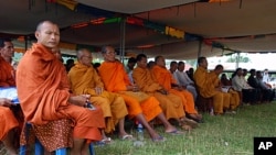 Monks attend the Khmer Rouge tribunal outreach in Samlaut district, western Cambodia on Friday 26, August 2011.