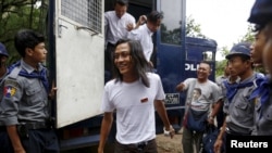 Student activist Min Thway Thit arrives at a mass trial of student protesters at Tharrawaddy court, Tharrawaddy, Bago division July 28, 2015