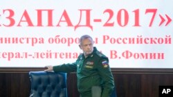 Deputy Defense Minister Lt. Gen. Alexander Fomin arrives for a briefing in Moscow, Russia, Aug. 29, 2017. The Russian military says major war games, the Zapad (West) 2017 maneuvers, set for next month will not threaten anyone.
