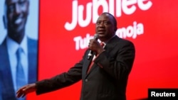 FILE - Kenya's President Uhuru Kenyatta delivers his speech during an event unveiling the Jubilee Party's manifesto in Nairobi, Kenya.