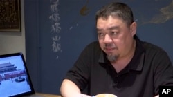 In this image taken from video footage shot on May 22, 2019, Wu'er Kaixi speaks during an interview in Taipei, Taiwan. Wu'er was among the most outspoken of the student leaders during the 1989 Tiananmen Square pro-democracy protests. (AP Photo)