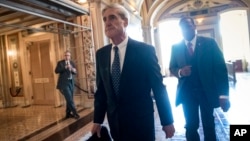 Special Counsel Robert Mueller departs after a closed-door meeting with members of the Senate Judiciary Committee about Russian meddling in the election and possible connection to the Trump campaign, at the Capitol in Washington, June 21, 2017.