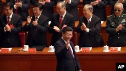 “习近平新时代中国特色社会主义思想”写入党章，成为中共行动指南