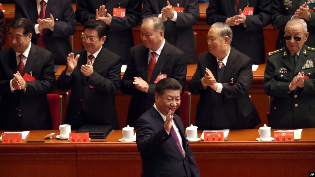 FILE - Chinese President Xi Jinping arrives for the opening session of China's 19th Communist Party Congress at the Great Hall of the People in Beijing, Oct. 18, 2017.