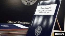 U.S. President Donald Trump's overview of the budget priorities for Fiscal Year 2018 are displayed at the U.S. Government Publishing Office (GPO) on its release by the Office of Management and Budget (OMB) in Washington, March 16, 2017. 
