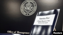 U.S. President Donald Trump's overview of the budget priorities for Fiscal Year 2018 are displayed at the U.S. Government Publishing Office (GPO) on its release by the Office of Management and Budget (OMB) in Washington, March 16, 2017. 