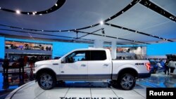 FILE - A 2018 Ford F-150 "King Ranch" pickup truck is displayed during the North American International Auto Show in Detroit, Michigan, Jan. 10, 2017.