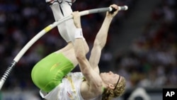 Australia's Steven Hooker, seen here at the World Athletics Championships in Berlin in 2009, used a pole made from carbon fibers to capture the gold at the 2008 Olympics in Beijing. 