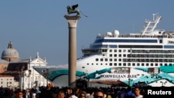 FILE - The Norwegian Jade cruise ship is seen from St. Mark square in Venice lagoon, June 16, 2012.